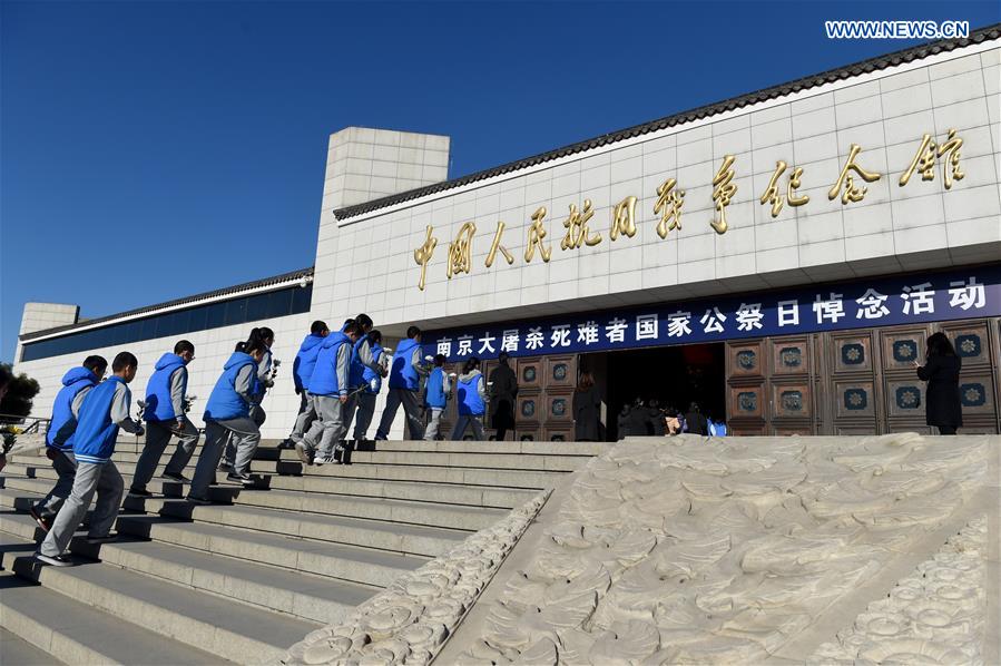 Xinhua Headlines: China observes national memorial day with praying for peace