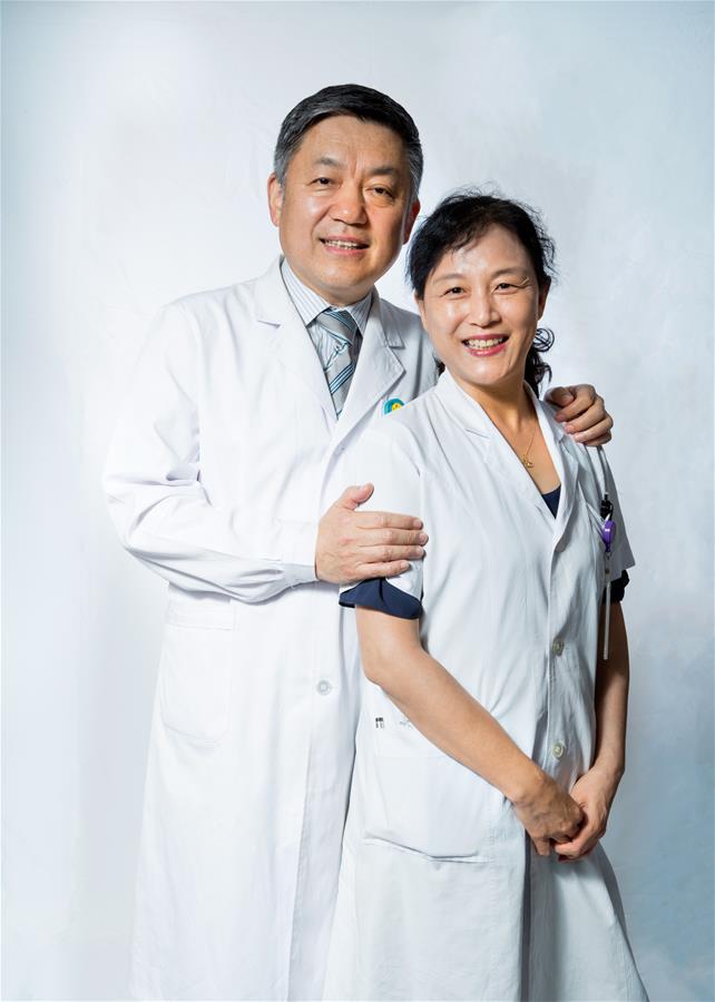 (FOCUS)CHINA-BEIJING-MEDICAL WORKERS' DAY-PHYSICIAN COUPLE (CN)