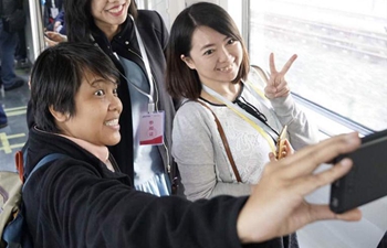 Chinese, foreign journalists visit command center of Beijing's subway