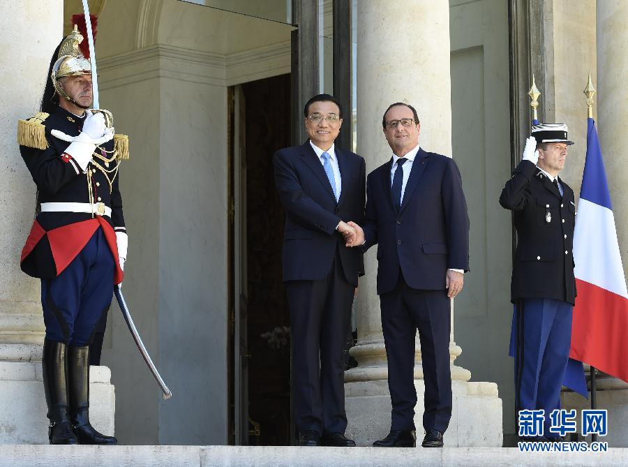 当地时间6月30日下午，国务院总理李克强在巴黎爱丽舍宫会见法国总统奥朗德。 新华社记者李学仁摄